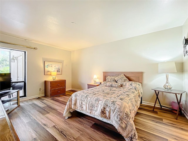 bedroom with light wood-type flooring