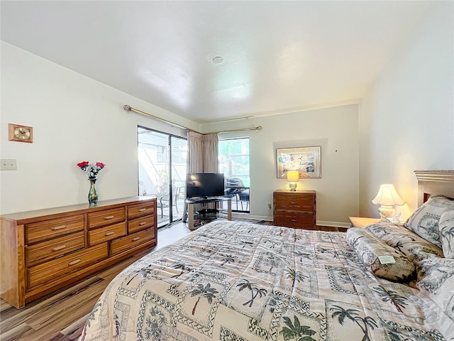 bedroom with light hardwood / wood-style flooring