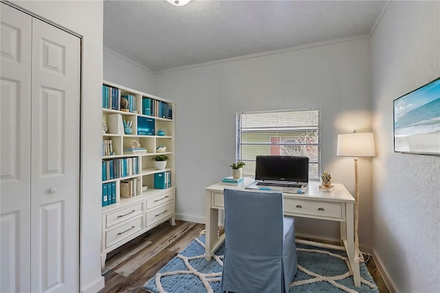 office area with crown molding and dark wood-type flooring