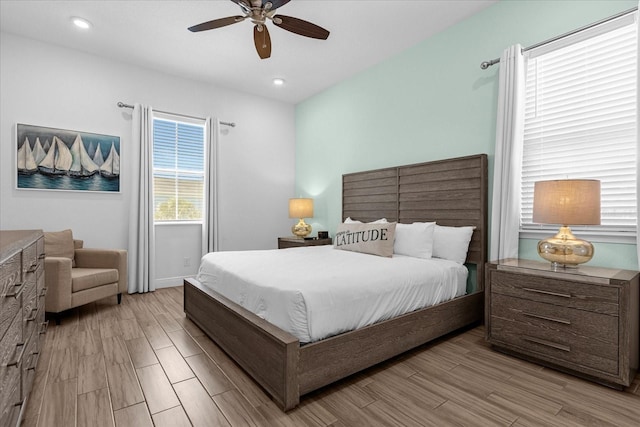 bedroom featuring ceiling fan and light wood-type flooring