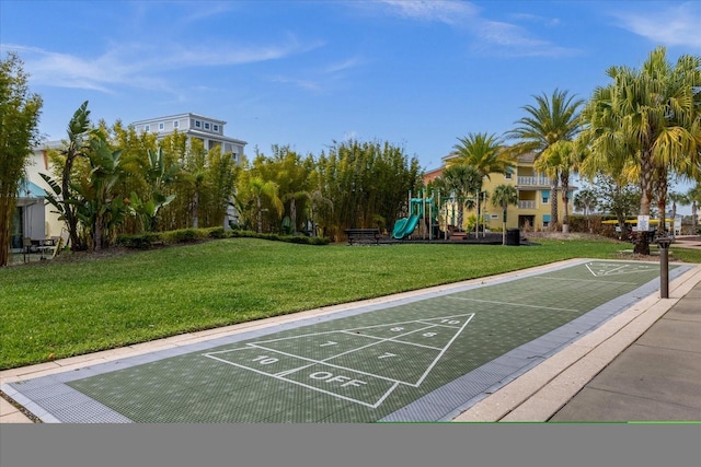 view of nearby features with a lawn and a playground