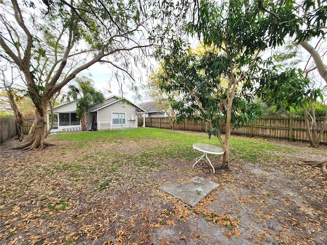 view of yard featuring a fenced backyard