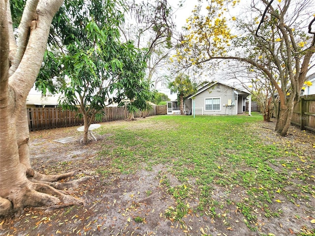 view of yard featuring a fenced backyard