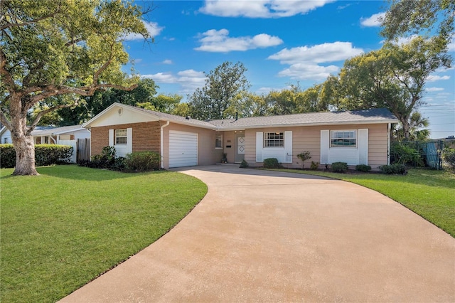 single story home featuring a garage and a front yard