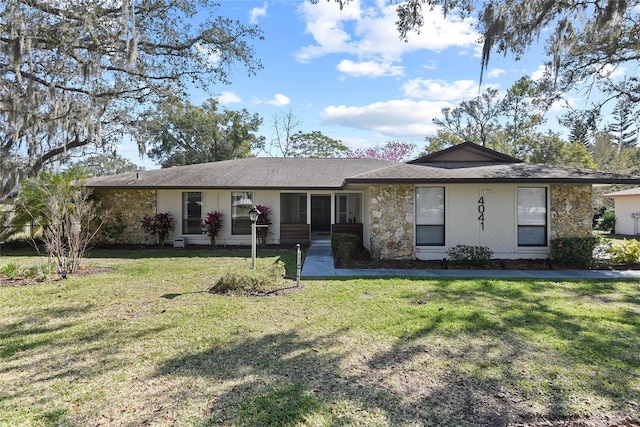 ranch-style house with a front yard