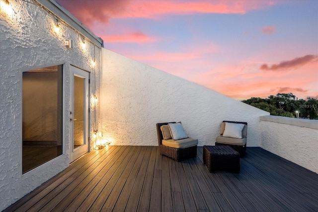 view of deck at dusk