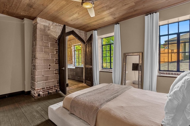 bedroom featuring wood ceiling, hardwood / wood-style floors, and ceiling fan