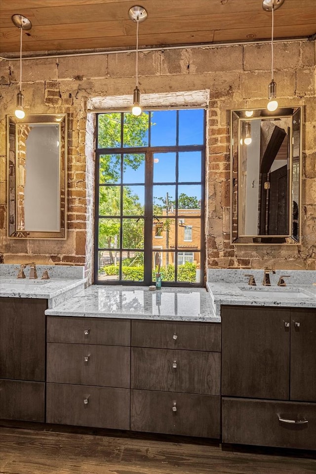 bathroom with wooden ceiling, vanity, and hardwood / wood-style flooring