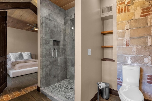 bathroom featuring hardwood / wood-style floors, ceiling fan, toilet, and wood ceiling