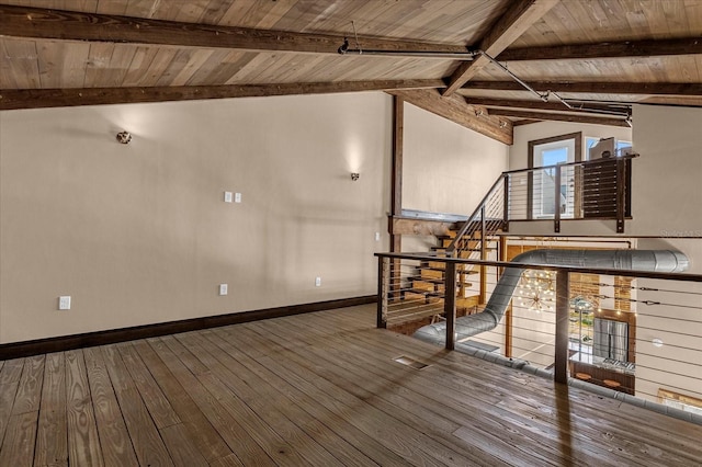 interior space featuring wooden ceiling, beam ceiling, high vaulted ceiling, and hardwood / wood-style floors