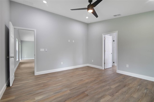 unfurnished room featuring wood-type flooring and ceiling fan