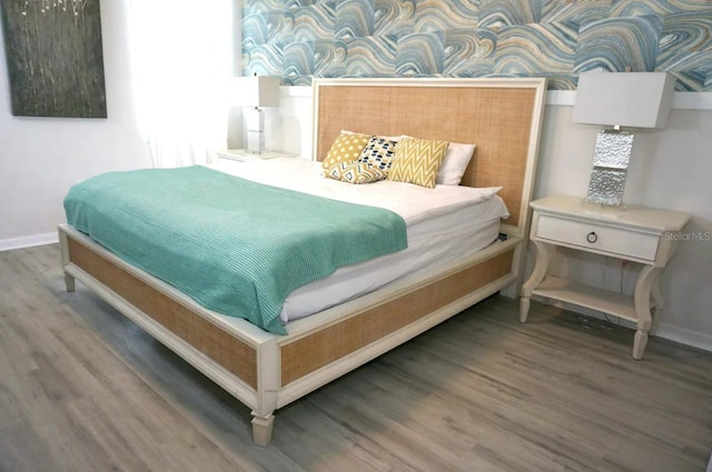 bedroom featuring dark wood-type flooring