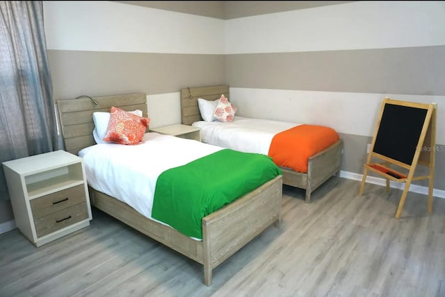 bedroom featuring light hardwood / wood-style floors