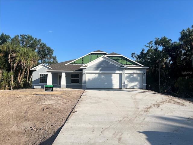 view of front of home with a garage