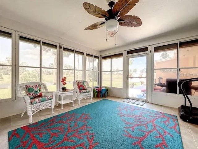 sunroom / solarium with ceiling fan