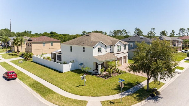 view of front of house featuring a front lawn