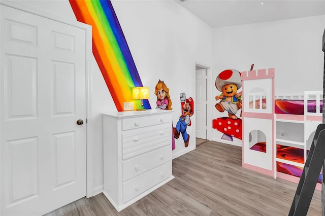 bedroom featuring light wood-type flooring