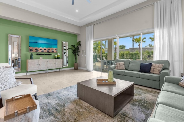 living room with tile flooring and ceiling fan