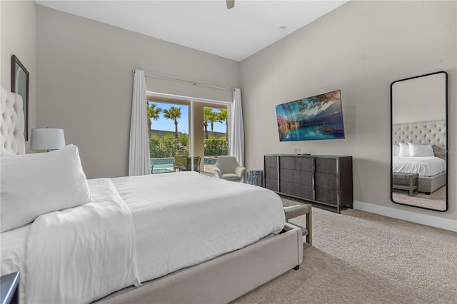 carpeted bedroom with lofted ceiling, ceiling fan, and access to outside