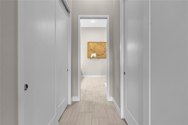 corridor with light tile floors