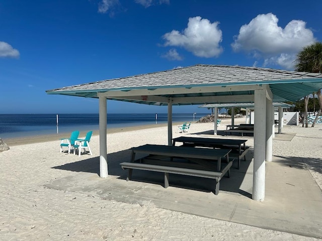 exterior space with a water view and a gazebo