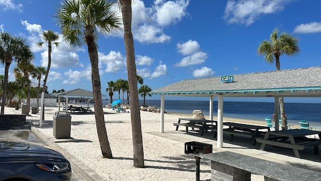 exterior space with a water view and a gazebo