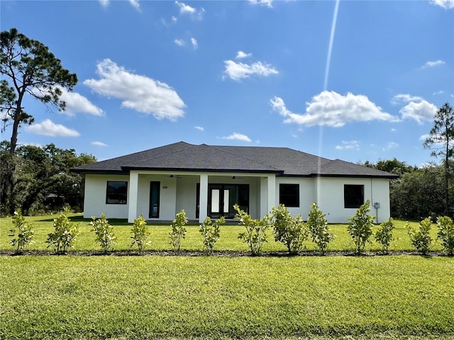 view of front of home featuring a front yard