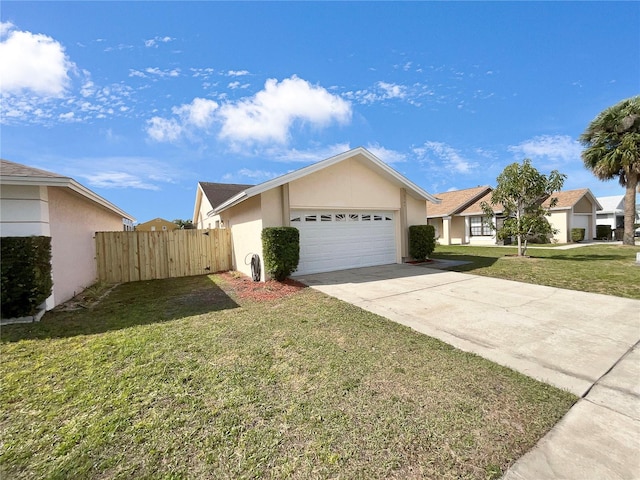 ranch-style house with a garage and a front lawn