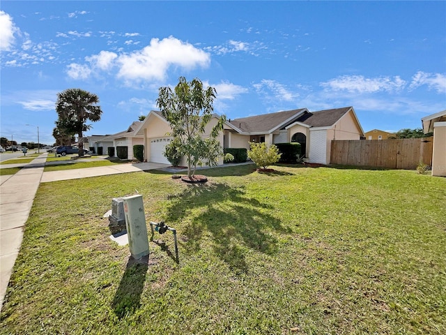 single story home featuring a front lawn