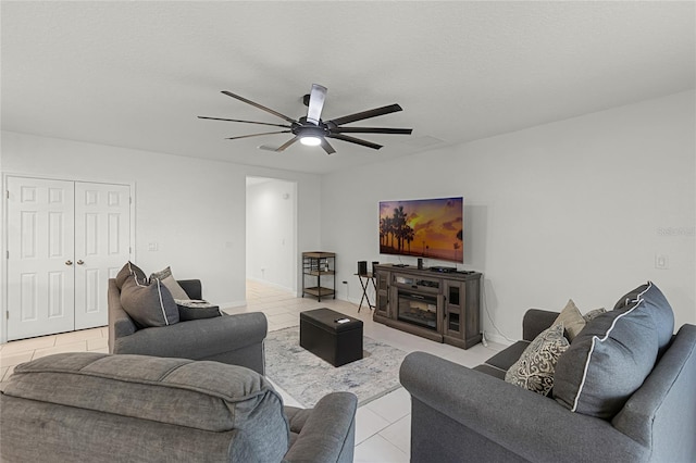 687 Campo Ln, Davenport, FL 33837 - living room featuring ceiling fan and light tile patterned floors