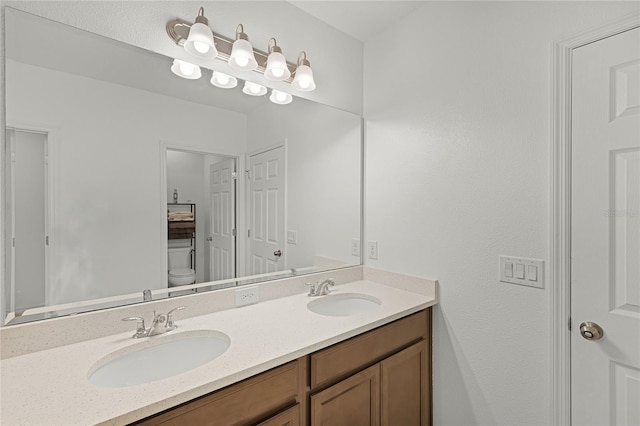 687 Campo Ln, Davenport, FL 33837 - bathroom with double vanity and toilet