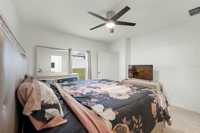 687 Campo Ln, Davenport, FL 33837 - carpeted bedroom featuring a ceiling fan and baseboards