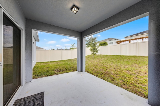 687 Campo Ln, Davenport, FL 33837 - fenced backyard featuring a patio area