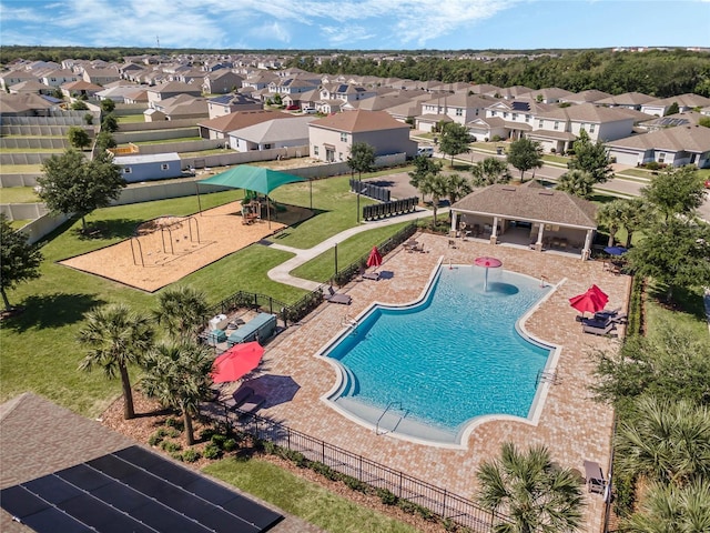 687 Campo Ln, Davenport, FL 33837 - community pool featuring a residential view