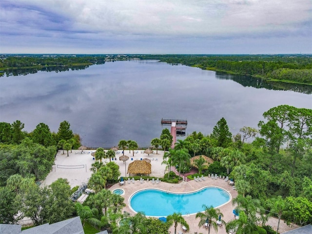 birds eye view of property with a water view