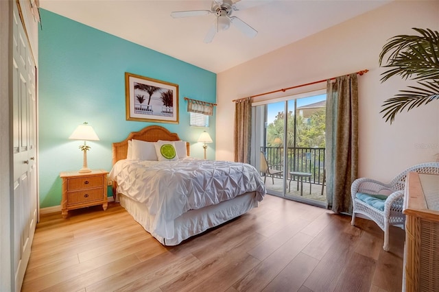 bedroom with access to outside, ceiling fan, and light hardwood / wood-style flooring