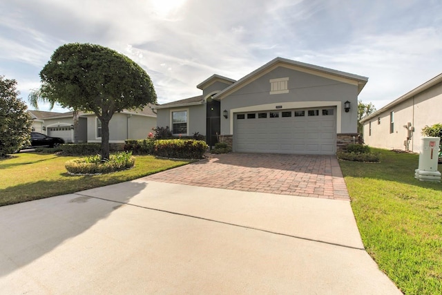 view of front of house with a garage and a front yard