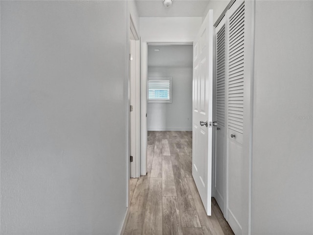 hall featuring light hardwood / wood-style flooring