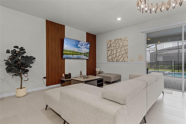 bedroom with a notable chandelier, light tile floors, and access to outside