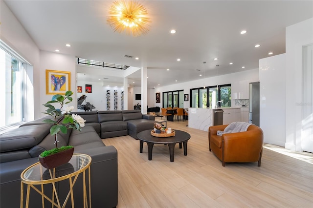 living room with light hardwood / wood-style floors