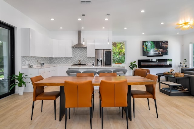 dining area featuring light hardwood / wood-style flooring