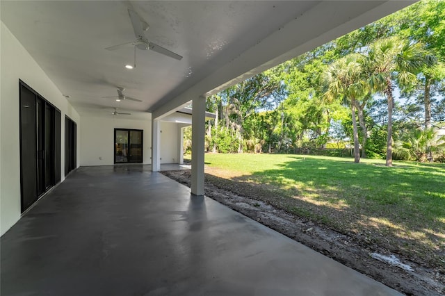 view of patio featuring ceiling fan