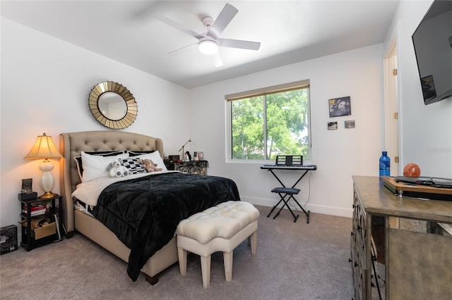 bedroom with dark carpet and ceiling fan