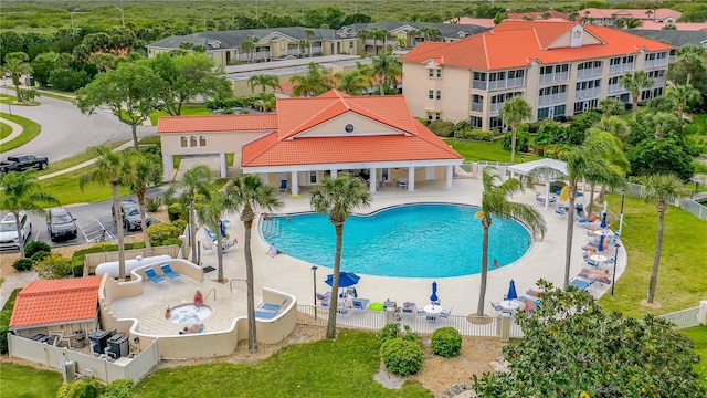 view of swimming pool featuring a patio area