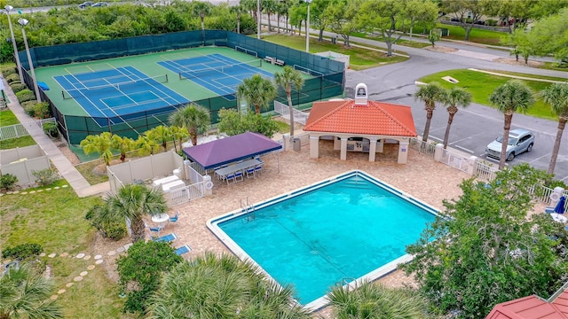 view of pool with a gazebo and tennis court
