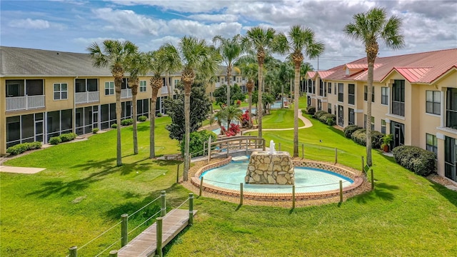 surrounding community with a lawn