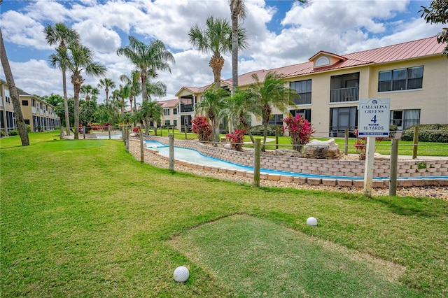 view of nearby features featuring a lawn