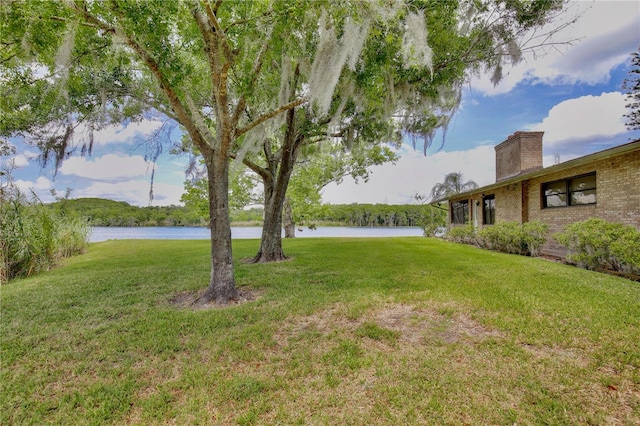 view of yard with a water view