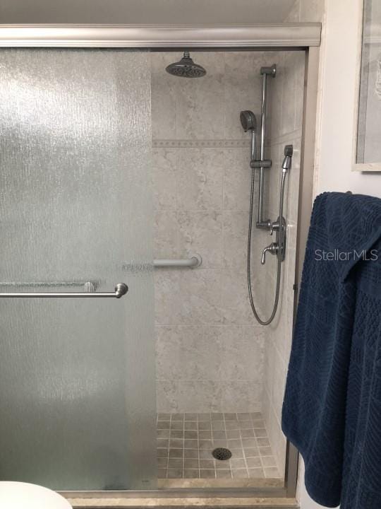 bathroom featuring walk in shower