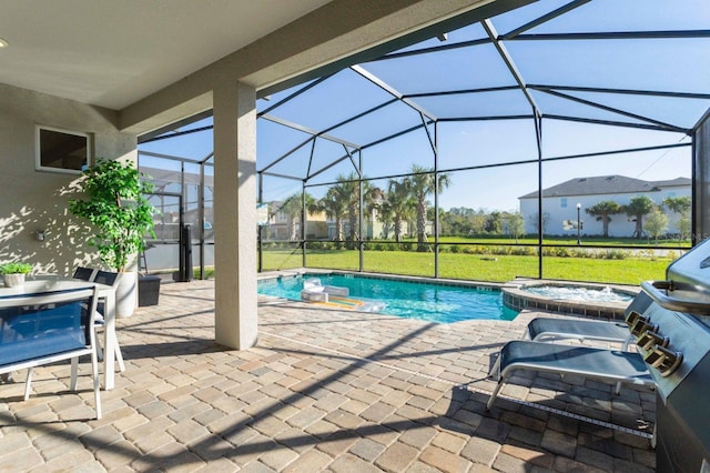 view of swimming pool featuring a patio, an in ground hot tub, and glass enclosure